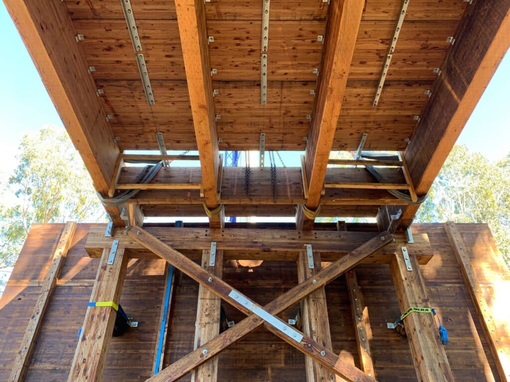 Underside of Dillmans Bridge showing driven timber piles and glulam girders