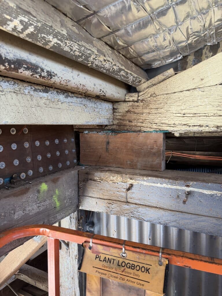 Fibre reinforcement applied to a timber member at the RASP mine workshop, Broken Hill